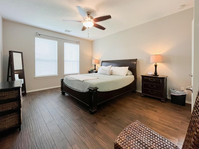 20223 Benton Springs Ln, Richmond, TX 77407 - bedroom featuring dark wood-style floors, baseboards, and ceiling fan
