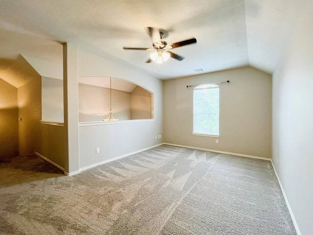 20223 Benton Springs Ln, Richmond, TX 77407 - empty room with vaulted ceiling, a ceiling fan, carpet, and baseboards