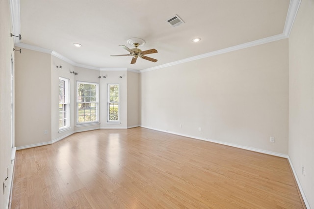 25187 Hill And Dale Ave, Splendora, TX 77372 - unfurnished room with a ceiling fan, ornamental molding, light wood-style flooring, baseboards, and recessed lighting