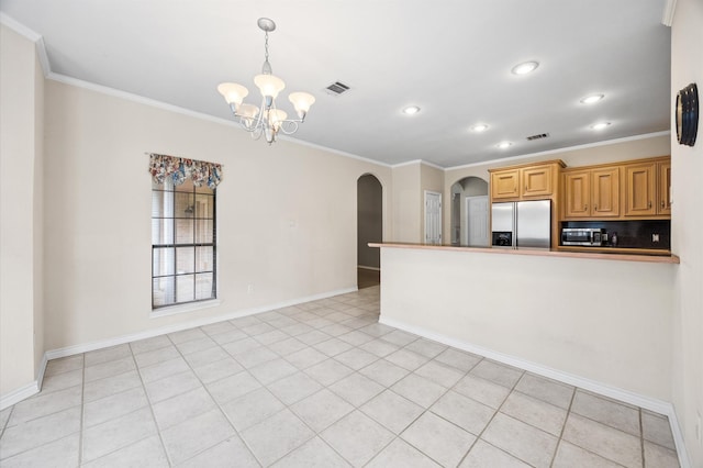 25187 Hill And Dale Ave, Splendora, TX 77372 - kitchen with appliances with stainless steel finishes, arched walkways, a chandelier, ornamental molding, and recessed lighting