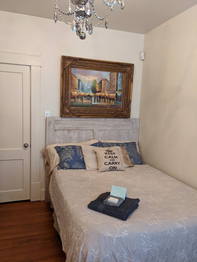 4204 Stanford St, Houston, TX 77006 - bedroom with a chandelier and wood finished floors