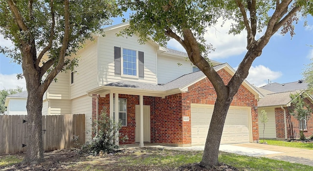 19646 Ballina Meadows Dr, Katy, TX 77449 - traditional-style home with fence, an attached garage, driveway, brick siding, and roof with shingles