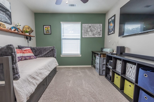 3010 Meadow Bay Dr, Dickinson, TX 77539 - carpeted bedroom with ceiling fan and baseboards