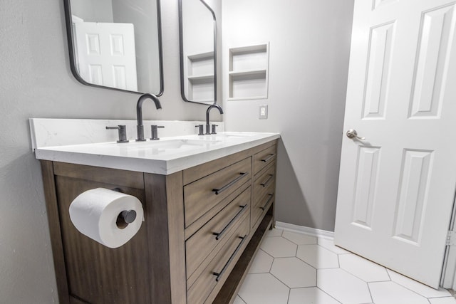 3010 Meadow Bay Dr, Dickinson, TX 77539 - full bath featuring double vanity and baseboards