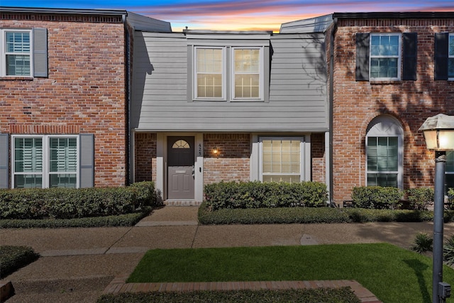 425 Bendwood Dr Unit 49, Houston, TX 77024 - view of property featuring brick siding