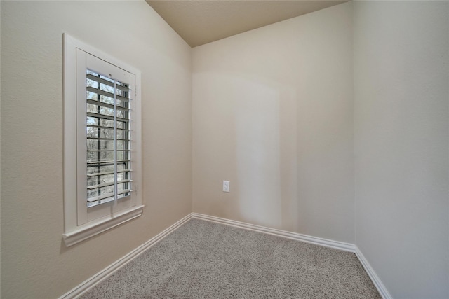 12119 Bayou Junction Rd, Cypress, TX 77433 - unfurnished room with carpet flooring, baseboards, and lofted ceiling