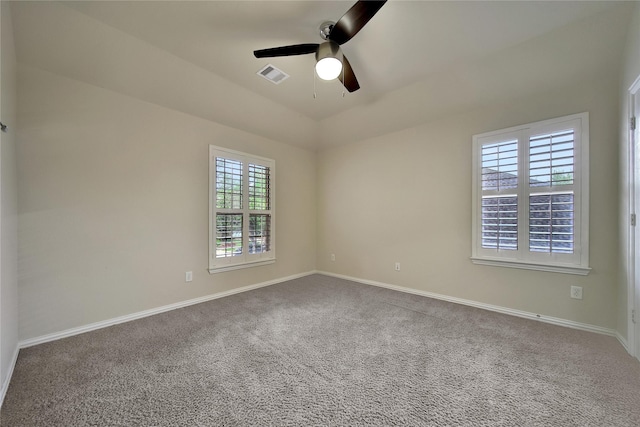 12119 Bayou Junction Rd, Cypress, TX 77433 - empty room with a ceiling fan, carpet, and baseboards