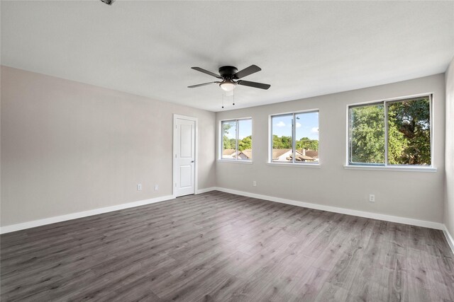 9110 Vickijohn Dr, Houston, TX 77031 - empty room with baseboards, wood finished floors, and a ceiling fan