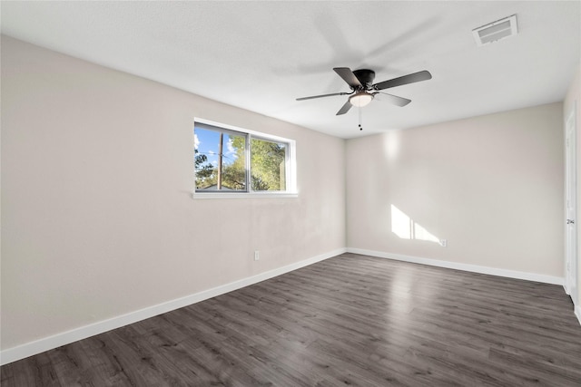 9110 Vickijohn Dr, Houston, TX 77031 - empty room featuring baseboards, a ceiling fan, and dark wood-style floors