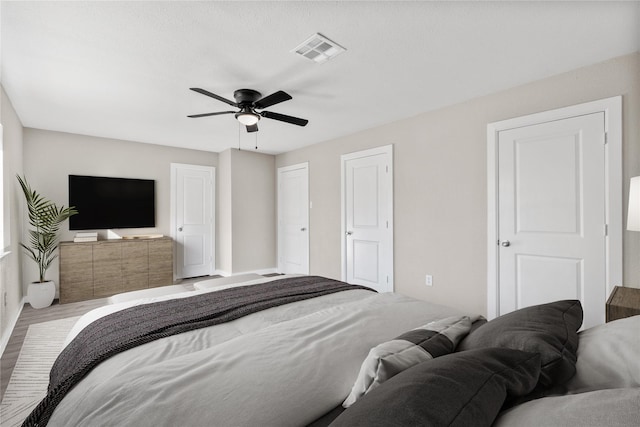 9110 Vickijohn Dr, Houston, TX 77031 - bedroom featuring wood finished floors and a ceiling fan