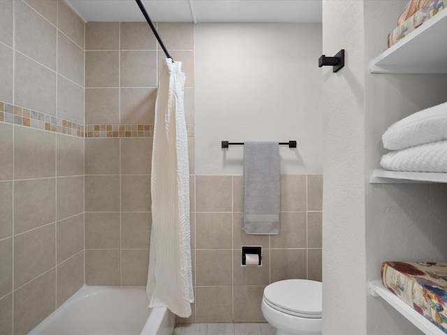 618 Forest Lake Dr, Seabrook, TX 77586 - bathroom with shower / tub combo, tile walls, and toilet