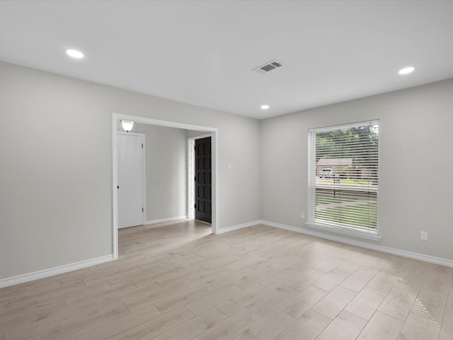 618 Forest Lake Dr, Seabrook, TX 77586 - unfurnished room featuring baseboards, recessed lighting, and light wood-style floors