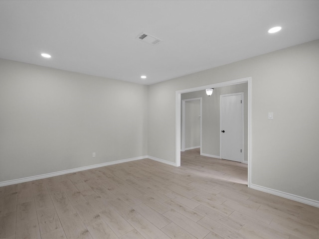 618 Forest Lake Dr, Seabrook, TX 77586 - unfurnished room featuring light wood finished floors, baseboards, and recessed lighting