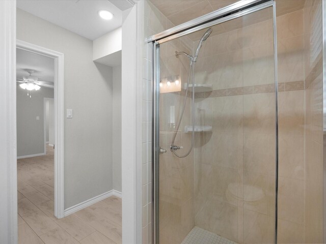 618 Forest Lake Dr, Seabrook, TX 77586 - bathroom with a stall shower and a ceiling fan