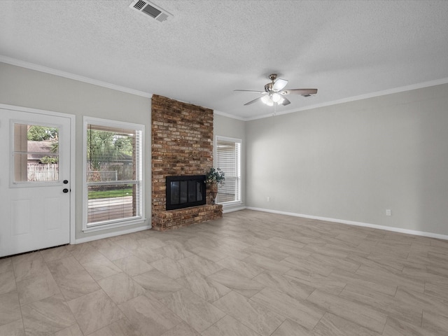 618 Forest Lake Dr, Seabrook, TX 77586 - unfurnished living room featuring a textured ceiling, ceiling fan, a fireplace, ornamental molding, and baseboards
