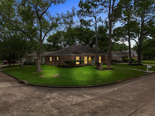 618 Forest Lake Dr, Seabrook, TX 77586 - single story home with a front yard and brick siding