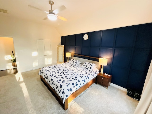 2507 Elmwood Trl, Katy, TX 77493 - bedroom featuring light colored carpet, lofted ceiling, ceiling fan, baseboards, and a closet