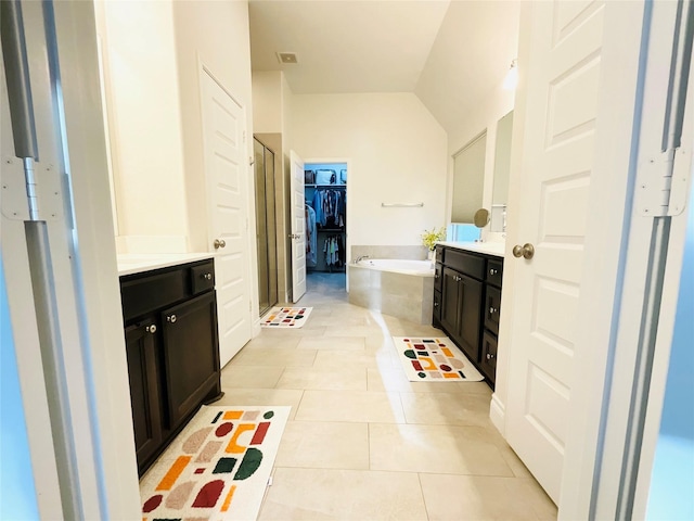 2507 Elmwood Trl, Katy, TX 77493 - full bath with vanity, a garden tub, a shower stall, and tile patterned flooring