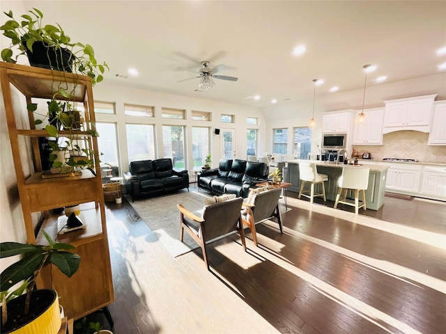 2507 Elmwood Trl, Katy, TX 77493 - living room featuring hardwood / wood-style floors, ceiling fan, and recessed lighting