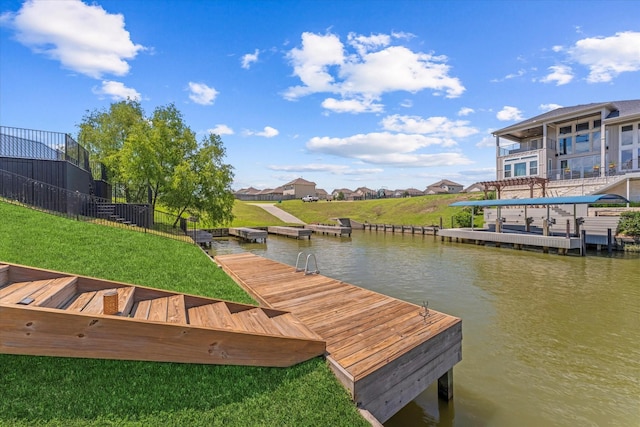 10744 S Lake Mist Ln, Willis, TX 77318 - dock with a water view and a yard