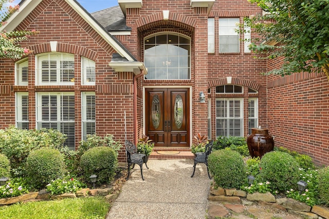 5819 Desert Oak Way, Spring, TX 77379 - view of exterior entry with french doors and brick siding