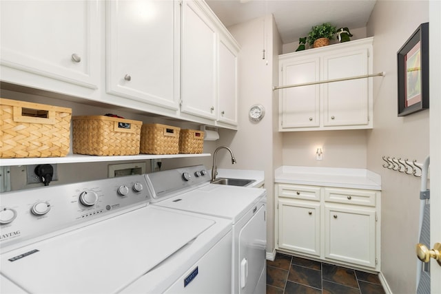 5819 Desert Oak Way, Spring, TX 77379 - clothes washing area with independent washer and dryer, cabinet space, dark stone finish floors, and baseboards
