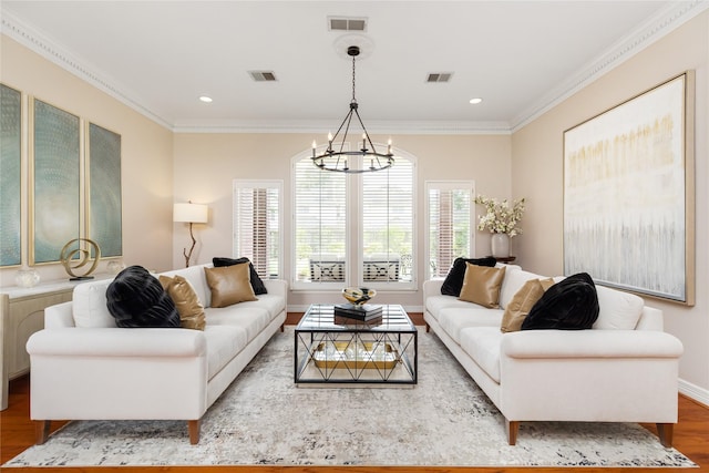 5819 Desert Oak Way, Spring, TX 77379 - living area featuring wood finished floors, a chandelier, crown molding, baseboards, and recessed lighting