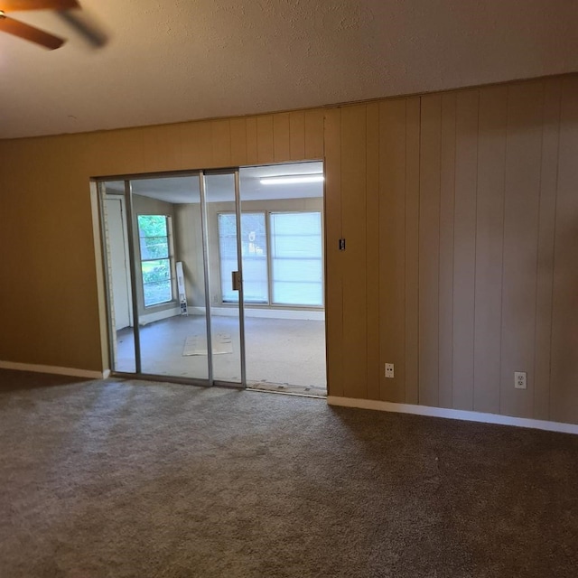 1229 Ramona St, Angleton, TX 77515 - carpeted empty room with ceiling fan and baseboards