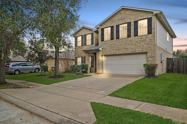 6010 Twin Crk, Missouri City, TX 77459 - traditional-style home featuring a garage, brick siding, and concrete driveway