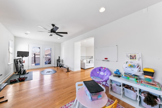 4301 Vivian St, Bellaire, TX 77401 - workout area featuring ceiling fan, wood finished floors, french doors, recessed lighting, and baseboards
