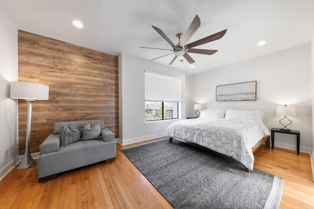 4301 Vivian St, Bellaire, TX 77401 - bedroom featuring baseboards, wood finished floors, recessed lighting, and ceiling fan