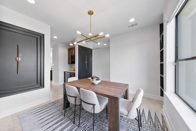 4301 Vivian St, Bellaire, TX 77401 - dining area featuring a chandelier, recessed lighting, and baseboards