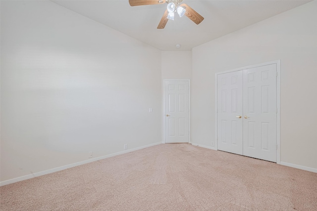 11606 Canyon Breeze Dr, Tomball, TX 77377 - unfurnished bedroom featuring light colored carpet, baseboards, a closet, and ceiling fan