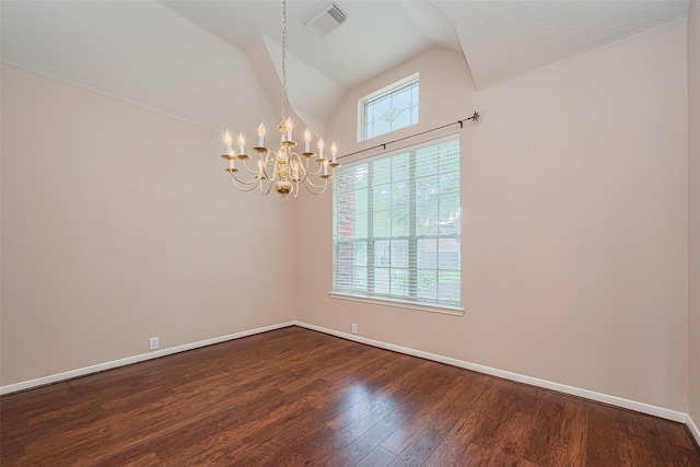 11606 Canyon Breeze Dr, Tomball, TX 77377 - empty room with dark wood finished floors, a chandelier, lofted ceiling, and baseboards