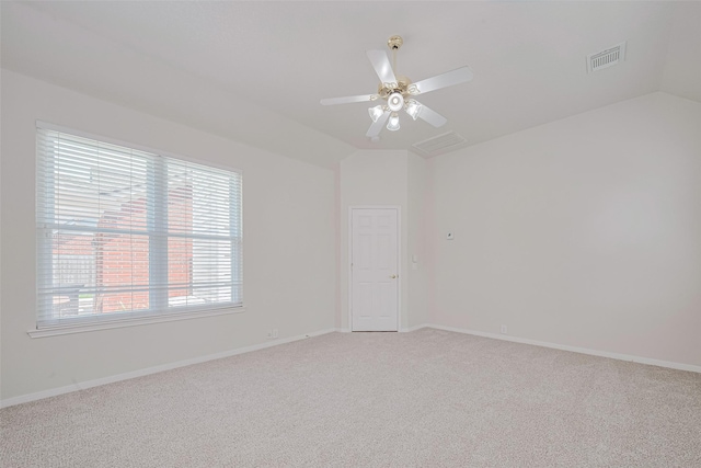 11606 Canyon Breeze Dr, Tomball, TX 77377 - carpeted spare room featuring lofted ceiling, ceiling fan, and baseboards