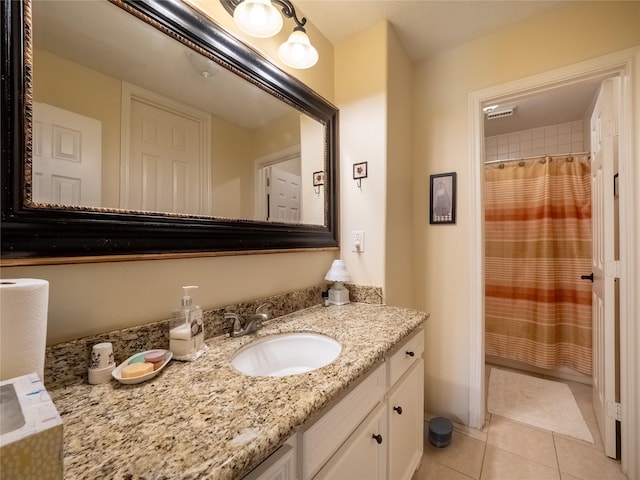 814 Hal Mclain Rd, Manvel, TX 77578 - full bathroom with tile patterned floors, vanity, curtained shower, and a bath
