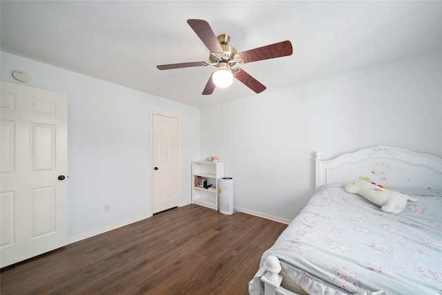 2111 Scenic Hollow Ct, Katy, TX 77450 - bedroom with dark wood-style floors, baseboards, and ceiling fan
