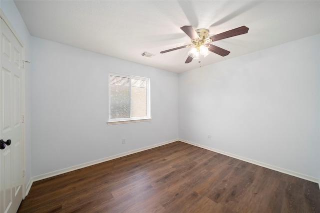 2111 Scenic Hollow Ct, Katy, TX 77450 - spare room with dark wood finished floors, baseboards, and a ceiling fan