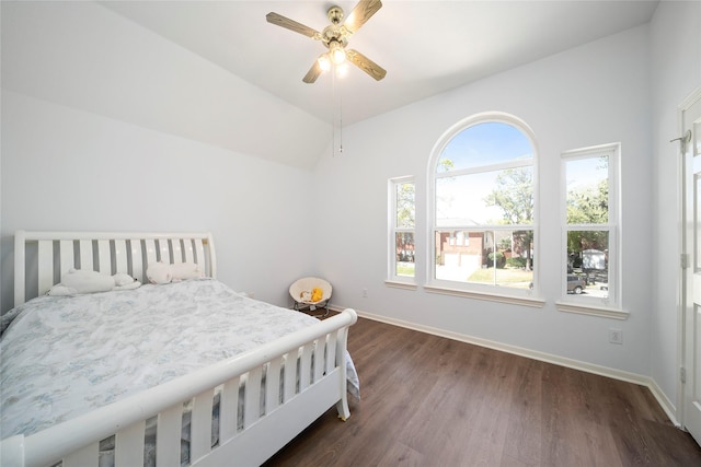 2111 Scenic Hollow Ct, Katy, TX 77450 - bedroom featuring dark wood finished floors, baseboards, lofted ceiling, and a ceiling fan
