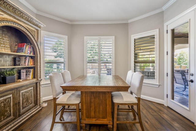 20103 Kirkstone Terrace Ct, Spring, TX 77379 - dining room featuring dark wood-type flooring, ornamental molding, and baseboards