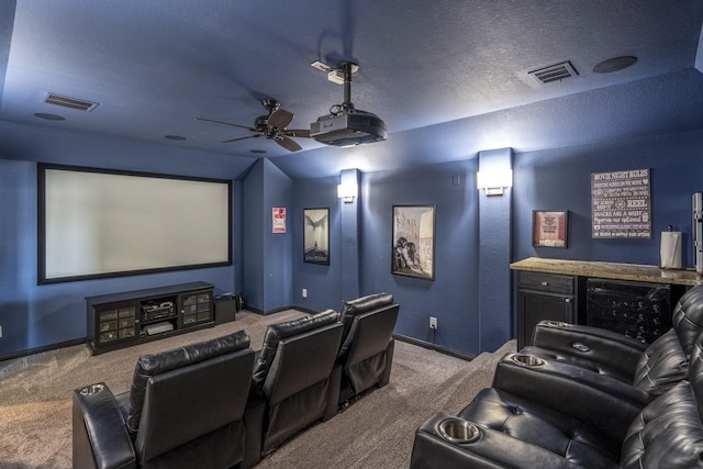 20103 Kirkstone Terrace Ct, Spring, TX 77379 - home theater with carpet floors, ceiling fan, lofted ceiling, baseboards, and a textured ceiling