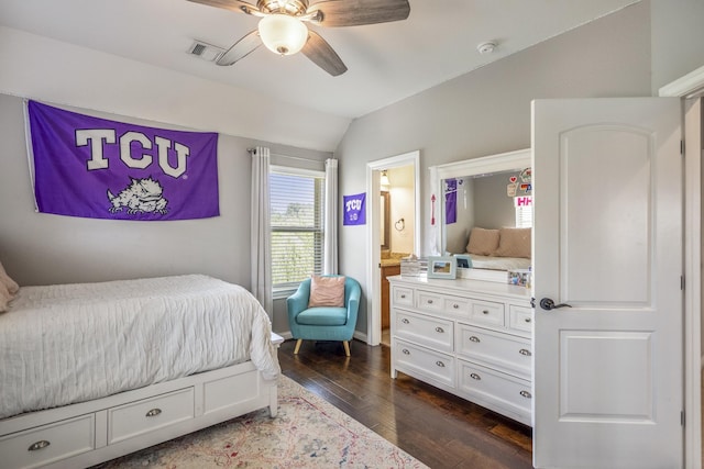 20103 Kirkstone Terrace Ct, Spring, TX 77379 - bedroom featuring lofted ceiling, dark wood-style floors, ensuite bathroom, ceiling fan, and baseboards