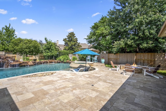 20103 Kirkstone Terrace Ct, Spring, TX 77379 - view of pool featuring an outdoor fire pit, a fenced backyard, a patio, and a pool with connected hot tub