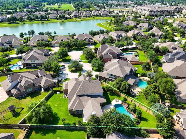 20103 Kirkstone Terrace Ct, Spring, TX 77379 - aerial perspective of suburban area featuring a pool area, property boundaries highlighted, and a large body of water