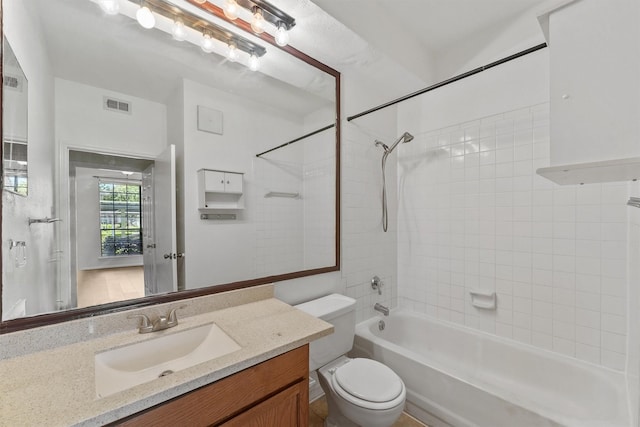 8055 Cambridge St Unit 21, Houston, TX 77054 - bathroom with toilet, vanity, and bathing tub / shower combination
