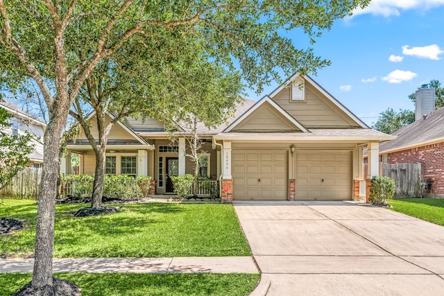10446 Antelope Aly, Missouri City, TX 77459 - view of front of property featuring brick siding, concrete driveway, a garage, and a shingled roof