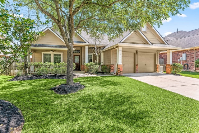 10446 Antelope Aly, Missouri City, TX 77459 - view of front of property with a garage, driveway, brick siding, and ceiling fan