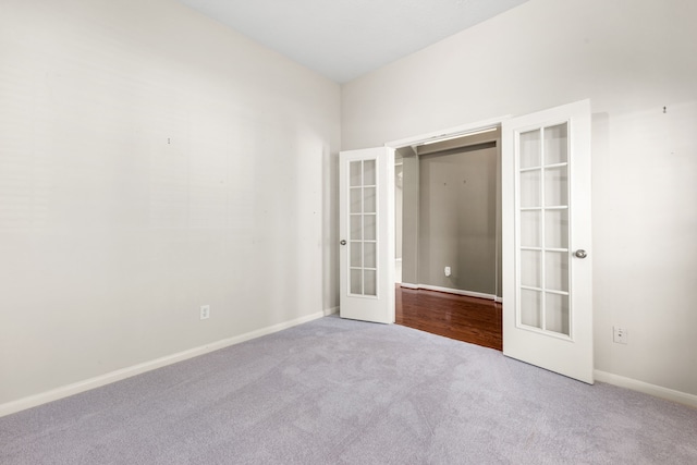 10446 Antelope Aly, Missouri City, TX 77459 - unfurnished bedroom featuring french doors, carpet flooring, and baseboards