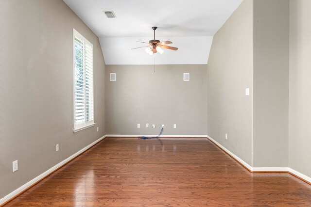 10446 Antelope Aly, Missouri City, TX 77459 - spare room with a ceiling fan, wood finished floors, lofted ceiling, and baseboards