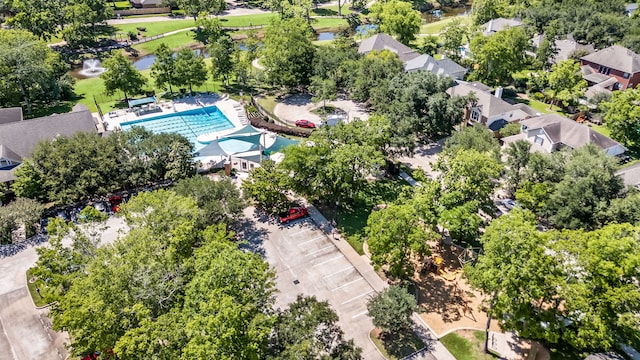 10446 Antelope Aly, Missouri City, TX 77459 - aerial view of residential area with a pool area and a large body of water